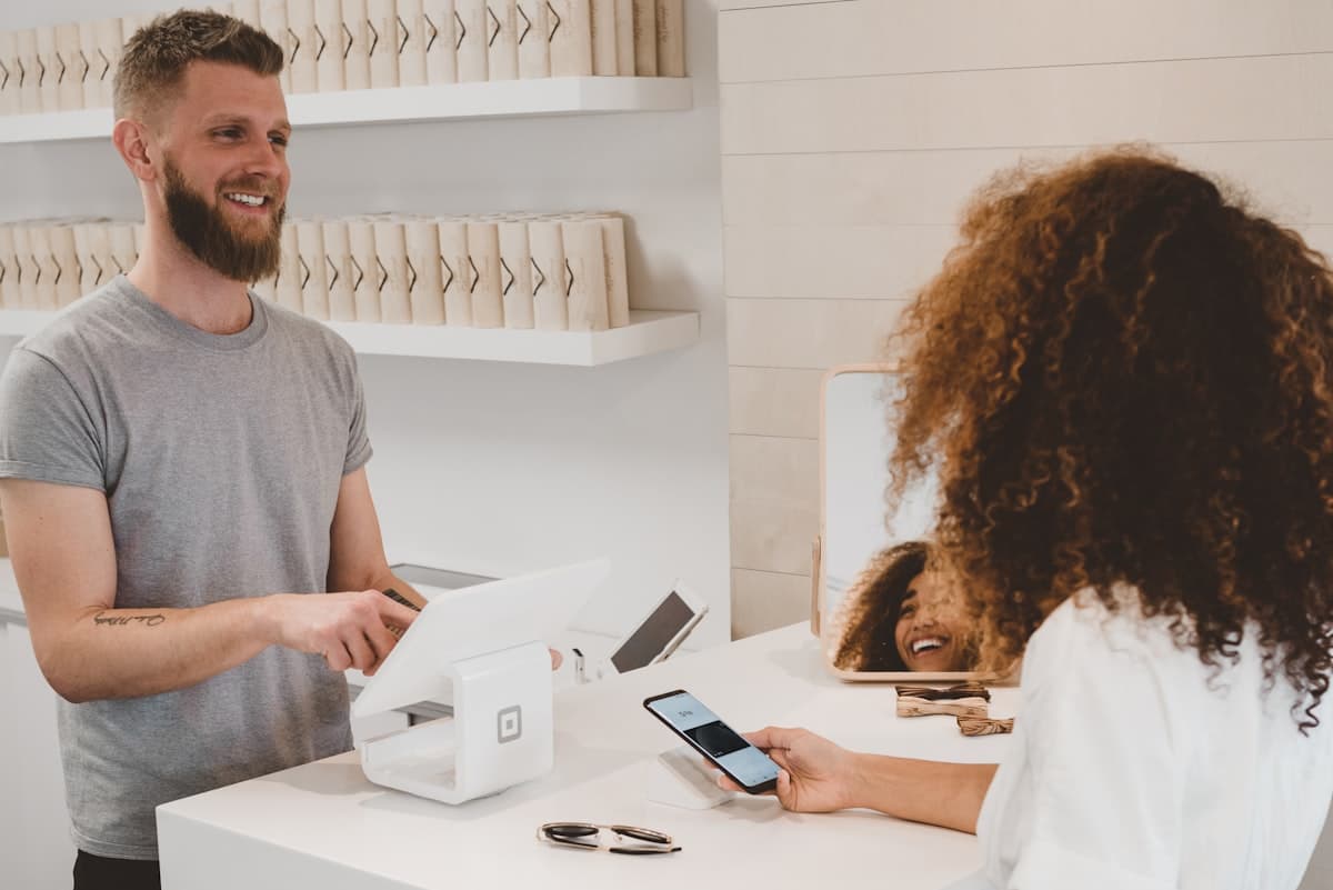 SAP Customer Experience — Happy customer completing a purchase
